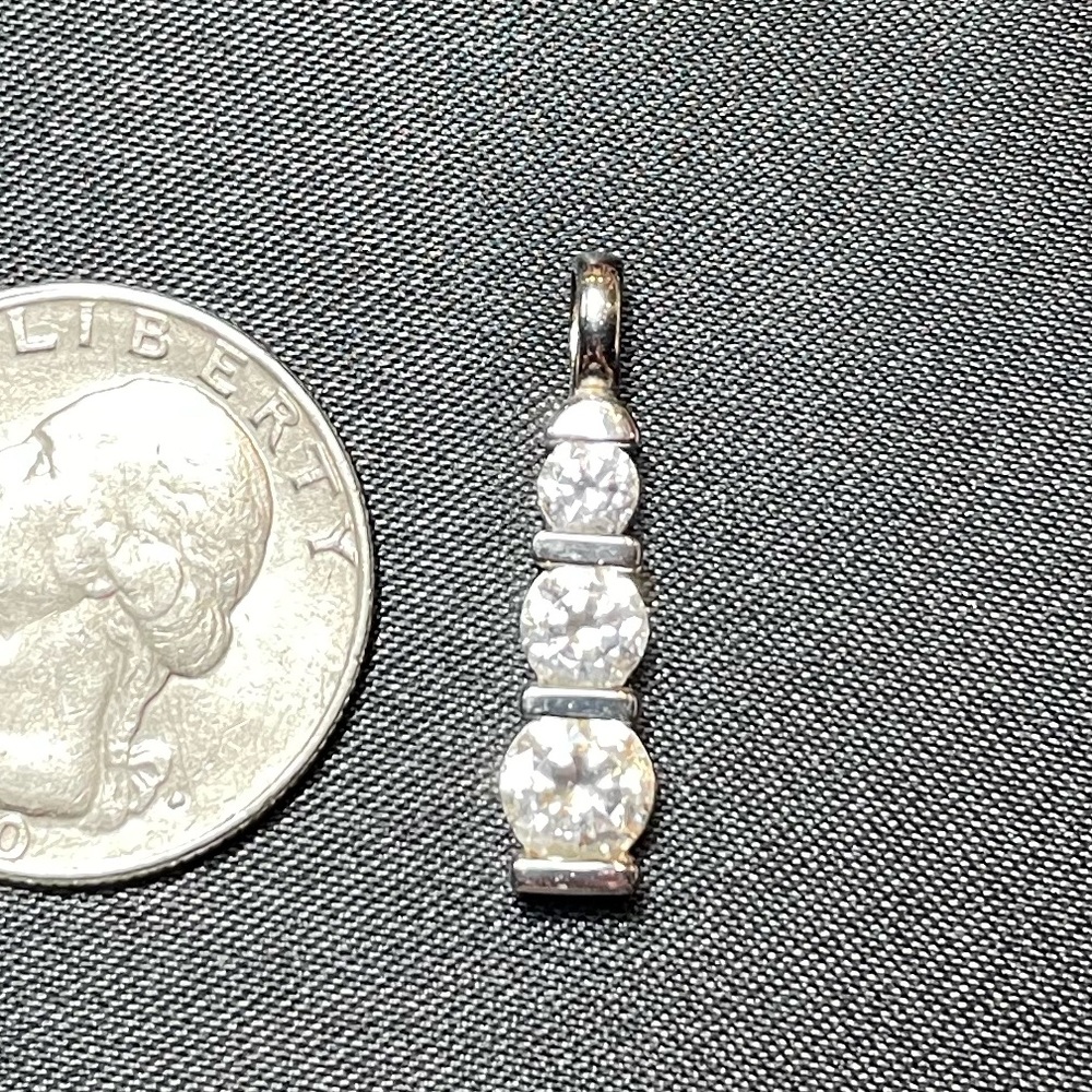 Gorgeous 3 stone simulated diamond pendant